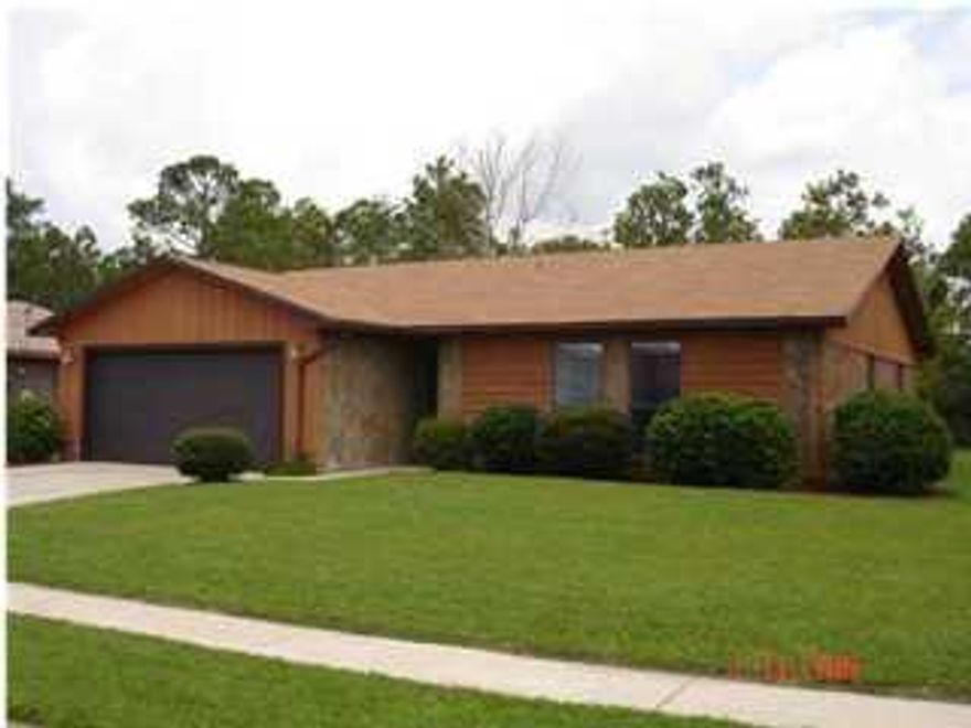 This nice home is in a well established neighborhood just a few miles West of Hurlburt Field. The exterior brick is complimented with cedar wood trimming and washed stone towards the entry way. This home also features a spacious living rom with a wood burning fireplace, ceramic tile in both bathrooms. Kitchen has ceramic tile flooring, stainless steel appliances and a self cleaning oven with 4 glass top burners. Nice size back yard with access to a nature trail for walking or bicycling. Any size pet allowed with non-ref pet fee.