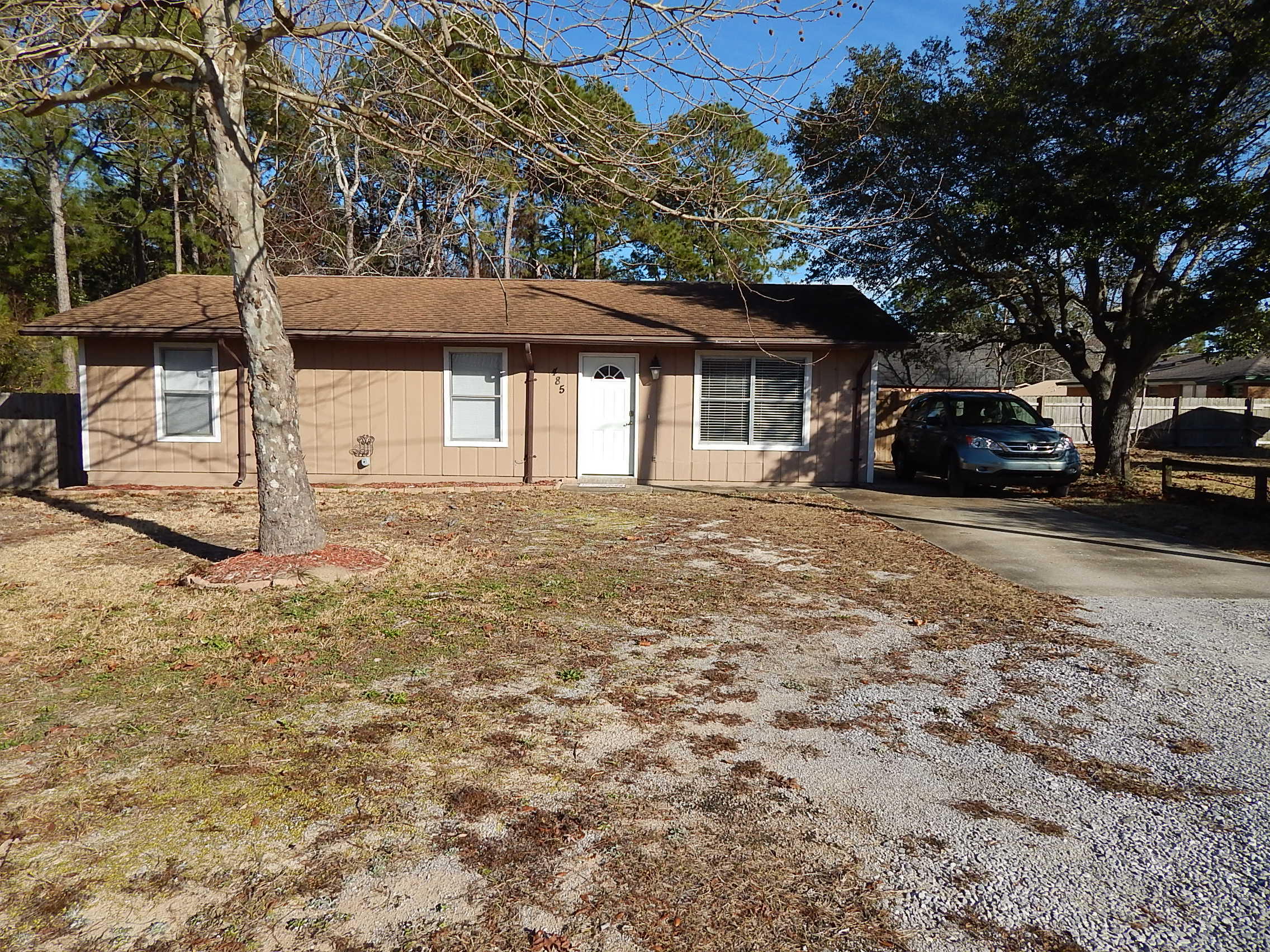 AFFFORDABLE HOME WITH HUGE YARD!!!! 3 Bedroom 1 Bath Plus Interior Laundry room! Located close to Beaches, Bases and Shopping! Just a few miles West of Hurlburt in the Mary. Home has been updated with fresh paint & wood-look laminate flooring! There is a nearly new HVAC and tankless hot water heater. The Living Room is spacious and opens the Dining room. The kitchen is fresh and clean and there is an inside Laundry room! All three bedrooms are large with closets and fan/lights. The Fenced Back Yard is HUGE! Perfect for Playtime and entertaining. There is a large deck and a Yard building with hard-board siding. There is a plenty of parking for RV or Boat. NO Homeowners Association. This is a GREAT HOME! A QUICK CLOSING IS POSSIBLE! Call to see it today!!!