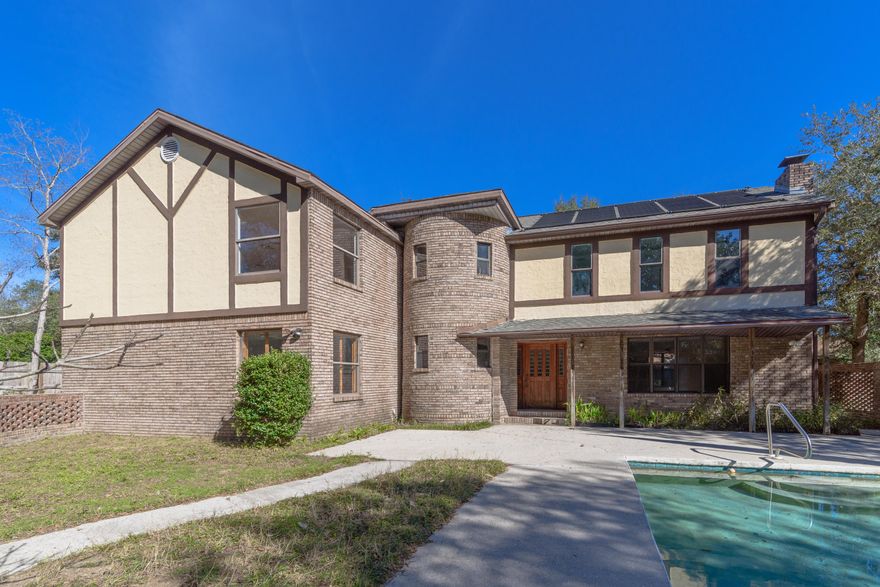 Sitting on a half acre lot in the desired neighborhood of Kenwood, this custom built Victorian style home even has a distinctive turret! To the right of the foyer a formal living room with a stoneand brick fireplace is perfect for gatherings. A surprise bonus in the kitchen is the oversized walk-in pantry with a food prep sink. This home has two master suites, one on the first floor. Looking for extra space? On the second floor you will find very spacious bedrooms. You can very easily convert one to a theater room, play area, home gym, etc. This home features a newer roof, (6 yrs old) 2 HVAC units, and solar panels. Outside enjoy the gunnite in-ground pool along with a pool house that includes a full bath.