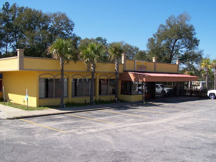 Great location for your restaurant! This space boasts 2 large dining rooms, separate banquet room, kitchen, walk in cooler, dry storage, office, and an outside deck perfect for entertaining. The property has plenty of parking on the almost 1 acre of land. Hurry, opportunities like this don't come along every day!