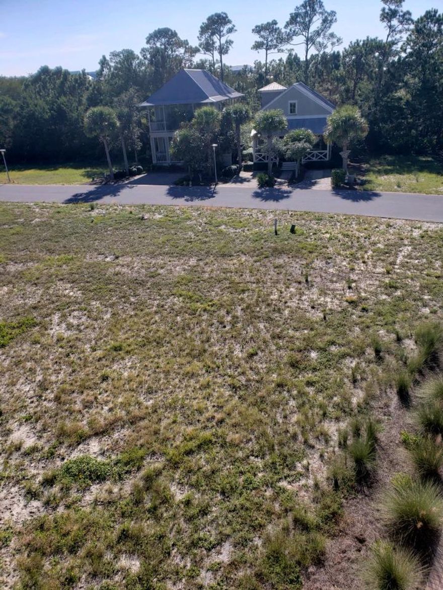 Tennis anyone!  This lot is located only 3 lots away from the Tennis Courts.  It's just waiting for you to build your dream home on so that you are located on the beautiful Emerald Coast.  This lot is also owned by the owners of Lot 2 who will be listing their home as well and could purchase both together.  Have a full time home and then have a vacation rental as well.  You are just a short distance to the beach. This lot is in a Flood Zone X  so you don't need to have flood insurance.  Great opportunity don't miss out on one of the lowest priced lots in Cypress Dunes!