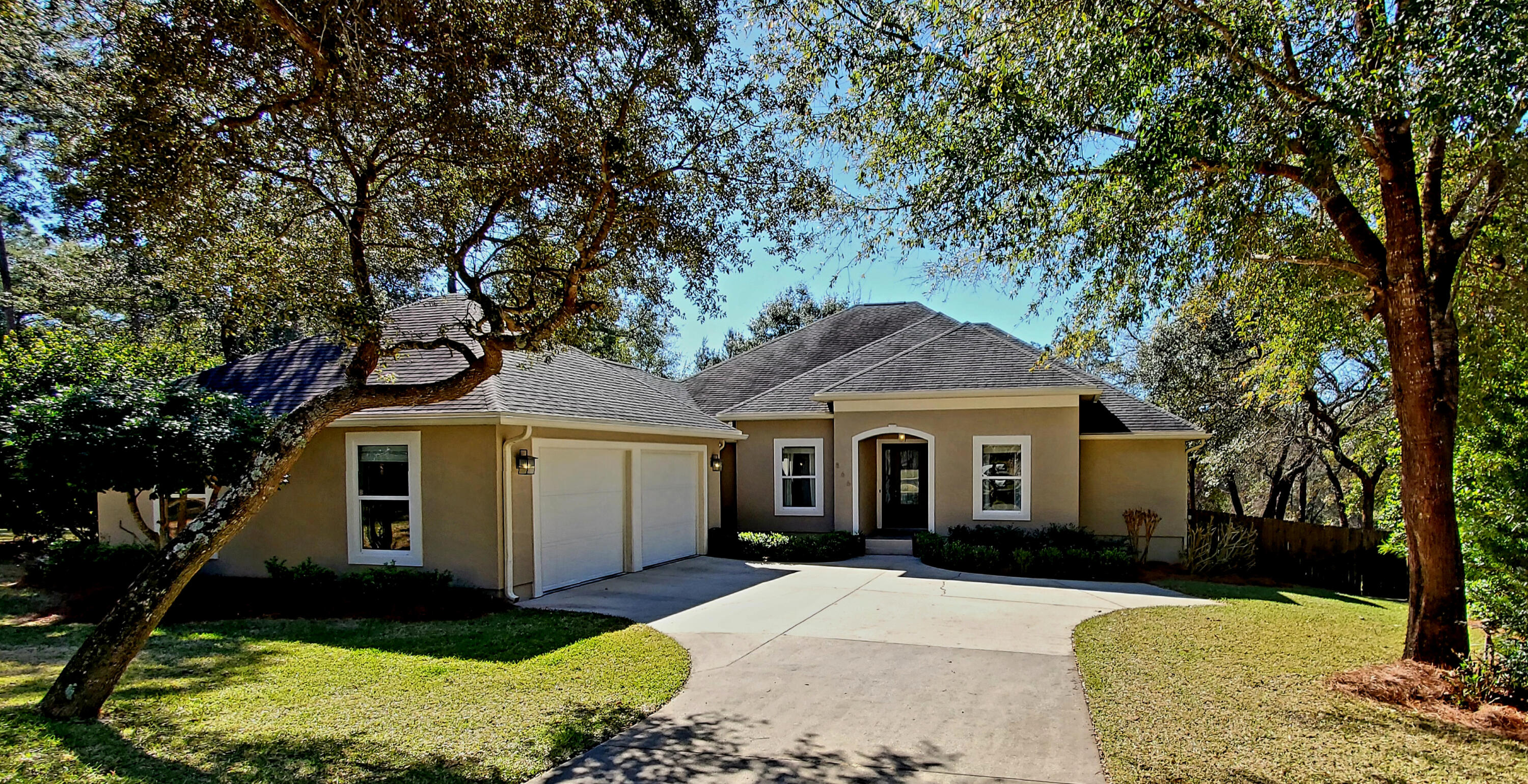 You will truly enjoy this beautiful custom built home with thoughtful lot setting among common area buffers on one side and back overlooking a nature preserve. This is a smart one level home with an open, flowing floorplan and private hallways leading to bedrooms. Low maintenance porcelain tile and wood plank flooring throughout. Upon entering this home, you are lead through the foyer and into the living room which flows into the spacious kitchen and cafe area. This is all well designed with windows letting in the southernly lighting. The screened porch and open patio area off of the living area are ideal for enjoying a morning coffee, relaxing or grilling. A formal dining room off to the side has french pocket doors and would also make an excellent study, craft room or even 5th bedroom.