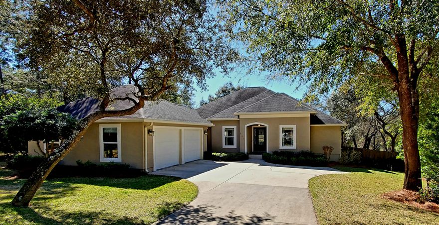 You will truly enjoy this beautiful custom built home with thoughtful lot setting among common area buffers on one side and back overlooking a nature preserve. This is a smart one level home with an open, flowing floorplan and private hallways leading to bedrooms. Low maintenance porcelain tile and wood plank flooring throughout. Upon entering this home, you are lead through the foyer and into the living room which flows into the spacious kitchen and cafe area. This is all well designed with windows letting in the southernly lighting. The screened porch and open patio area off of the living area are ideal for enjoying a morning coffee, relaxing or grilling. A formal dining room off to the side has french pocket doors and would also make an excellent study, craft room or even 5th bedroom.