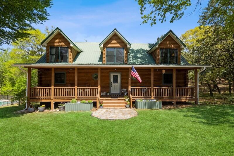 Welcome to your dream home!! This breathtaking 3-bedroom, 2.5-bath log cabin combines rustic charm with modern luxury on 9 private acres. With 2,100 square feet of beautifully finished living space, this home features fully updated kitchen and bathrooms, and a partially finished, heated and cooled basement offering an additional 1,344 square feet--perfect for a home gym, rec room, home offices or extra living area.The exterior logs have been re-caulked and re-stained, and the interior logs chinked, preserving the authentic log cabin feel while ensuring comfort and efficiency. Relax in the hot tub, cool off in the pool, or enjoy the serenity of your private pond.Outside, over 1,500 square feet of front and back porches offer ideal space for entertaining or unwinding. Horse lovers will appreciate the open acreage ideal for grazing or adding paddocks and stalls. Additional features include new pole barn, detached 2 car garage with 220v, hardwired surveillance system with 8 cameras covering property, fenced backyard, RV parking with cover, tons of storage, Starlink internet system and a brand new pool liner.
This rare property perfectly blends peace, privacy, and functionality with a quick 10 minute drive to downtown Defuniak Springs. Whether you're looking for a full-time residence or a weekend escape, this stunning log cabin has it all. Don't miss out on this spectacular property! Schedule your showing today! Welcome Home!!