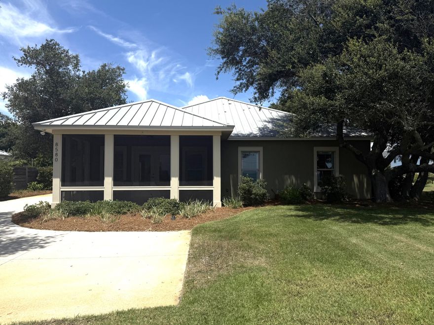 Incredible views of the Gulf of America atop a beautiful high bluff that is immaculately landscaped. This home has never been in a rental program and was completely renovated by Phil Collier Construction in 2016. Homeowner is meticulous with the upkeep of the home and grounds which makes this one of the most clean and tidy homes one will ever see. Ease of access and entirely on one level with dual parking bay with a large enclosed storage room for all of one's beach toys and goodies. Home is an open and spacious floor plan that flows well from the front screened porch through the large great room that has lovely trim and plantation shutters. Kitchen has granite topped island/bar with undermount Kohler sink, stainless Maytag appliances with custom cabinetry. Beautiful and durable Cortec flooring throughout with exception of tiled bathrooms. Double back entries allow access via the park area that also has spacious outside storage. The master bedroom with En Suite that has views of the Gulf. Master has walk in closet seating area, plantation shutters, and Florida trim package. Master bath is beautifully tiled with a large walk-in shower, double vanity with granite top, additional walk-in closet, and linen closet. The back two bedrooms share their own full bath as well as a laundry closet and are divided by a rear entry. Grounds are well kept with mature landscaping and irrigation system. Home is foam insulated and the outside is finished with concrete for added insulation. X flood zone for savings on flood insurance if desired. Termite protection is transferable. Easy beach access via Beacon Hill Park. Additional parcels available or the owner will sell without the back lot included. Appointment only but generally easy to show. Don't let this marque property pass you by!! Take a moment to view our 3-D Matterport visual to truly appreciate this coastal gem!