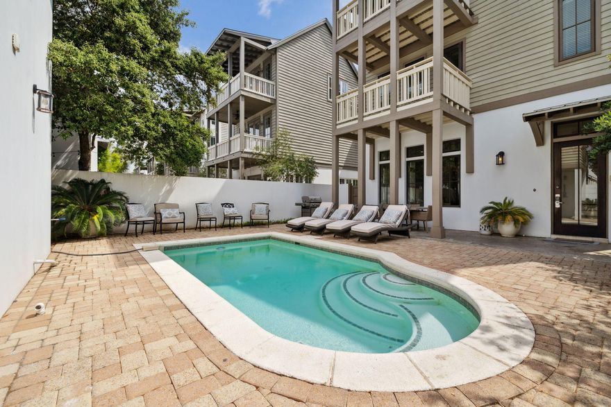 Positioned within the exclusive Costa Carina enclave of Inlet Beach, this three-story retreat--complete with a detached carriage house and private pool--offers the pinnacle of relaxed luxury just moments from the gulf. With five bedrooms and five-and-a-half baths spread across nearly 3,000 square feet, the home is designed to accommodate effortless entertaining and quiet coastal living in equal measure. In the main residence, four bedrooms each feature private ensuite baths, chic finishes and flatscreen TVs. On the third floor, dual primary suites impress with vaulted ceilings, spa-inspired baths with soaking tubs and walk-in showers, and access to a private balcony for sunset views. A secondary living area on the second floor adds flexibility, ideal for kids or quiet evenings away from the bustle. The first floor was built for gatheringanchored by a stylish chef's kitchen with stainless steel appliances, a beverage fridge and generous counter space. The open-concept living and dining areas flow seamlessly to the outdoor patio, where the courtyard pool, loungers and grilling station await. The detached carriage house adds even more versatility with a full kitchen, living room, queen bedroom and bathperfect for guests, in-laws or long-term stays. Located across the street from Rosemary Beach and near Alys Beach, 30Avenue and scenic walking paths, this move-in-ready, fully furnished home has no HOA and immediate access to some of 30A's best dining, shopping and shoreline. Experience elevated coastal living in one of Inlet Beach's most refined and intimate neighborhoods.