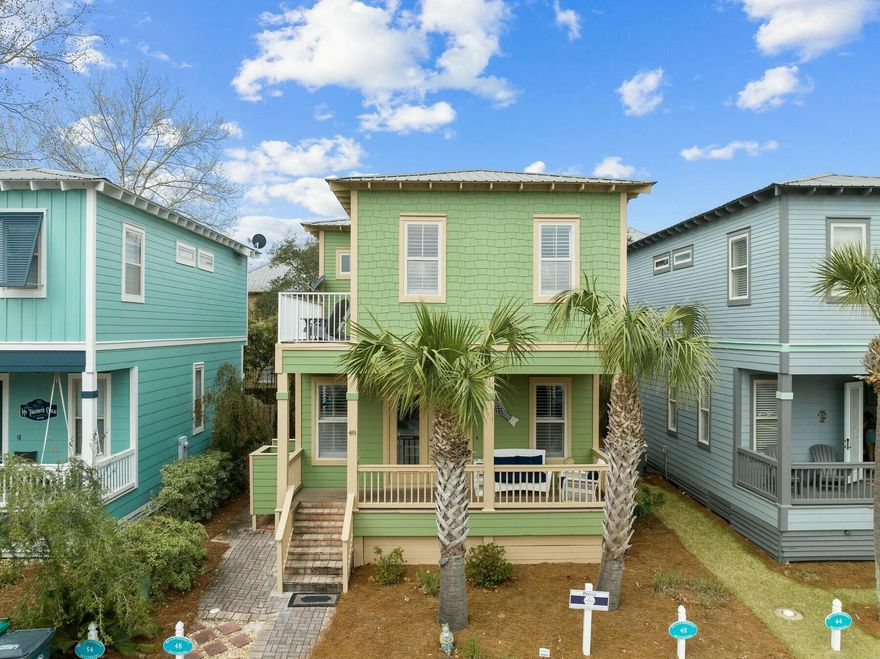 Located in the Beach Nest community of Blue Mountain Beach, this charming and thoughtfully updated cottage offers a perfect getaway with both tranquility and accessibility. Just steps from the community pool and less than a half-mile from the sugar-white sands of the gulf, this inviting retreat is ideally situated for enjoying all that 30A has to offer. Within a mile, a variety of dining options await, including Shunk Gulley, Mimmo's, Local Catch and Goatfeathers. Outdoor enthusiasts will love the easy access to the Longleaf Pine Greenway Trail for hiking and nearby Draper Lake for kayaking and paddleboarding. Whether looking for a personal beach escape, a second home or a vacation rental investment, this property provides an incredible opportunity in one of South Walton's most desirable locations.  The owners have also made some recent improvements including exterior painting of the home, including porches, new fans on the front porch, all new interior flooring throughout, all interior walls and ceilings repainted, cabinets repainted throughout, new washer and dryer, new built-in microwave, new furnishings on the first floor and the backyard has been professionally cleaned up and refreshed. With 1,499 square feet of thoughtfully designed living space, this three-bedroom, two-and-a-half-bath home comfortably accommodates up to eight guests. The open-concept main floor is ideal for relaxing and entertaining, featuring a spacious living area with a sleeper sofa and a well-appointed kitchen with a breakfast bar. Upstairs, the primary suite boasts a king bed, private balcony and an ensuite bath. A queen bedroom and a bunk room with a twin trundle offer additional sleeping options. The outdoor shower, private backyard and two designated parking spaces add to the home's appeal. The Beach Nest HOA allows both short- and long-term rentals, making this an excellent investment opportunity with short term annual gross rental projections of $30,000 to $35,000. With multiple beach access points, bike and nature trails and the vibrant Gulf Place town center just minutes away, this is the perfect coastal retreat for making unforgettable beachside memories.