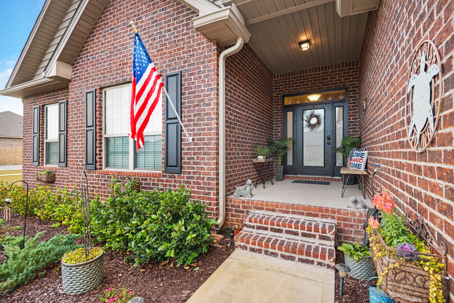 Located on one of the largest corner lots in Peach Creek this home is amazing! The huge open kitchen boasts bisque kitchen cabinets, a large walk in pantry, granite countertops and a tile backsplash. The sunroom in the original plans is now a large sitting room with a double sided fireplace opening into the living room. The living room has a double tray ceiling as does the master bedroom. Crown molding in the entry, living room, formal dining room and the master bedroom. Both the front bedroom and the master bedroom have large walk-in closets. Come see for yourself today! The contents of the garage including the cabinets and work bench do not convey.