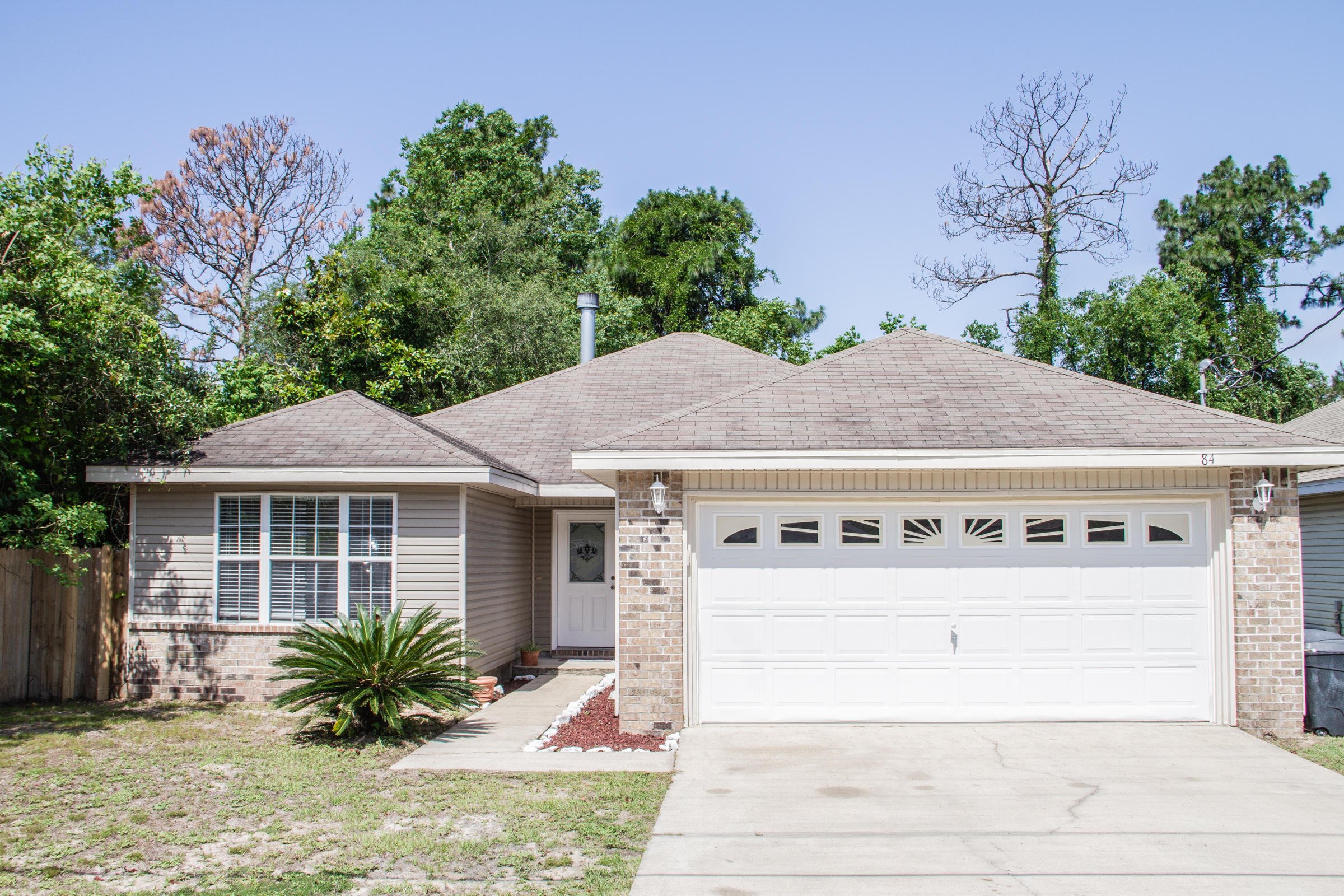 AVAILABLE... July 10, 2020. This 3 bed/ 2 bath home boasts an open floor plan.. Minutes to Destin & all the amenities - not to forget the world's most beautiful beaches via the Mid-Bay Bridge Connector. Kitchen is well equipped with granite counter tops, under mount sink, and Stainless Steel appliances. Family Room has vaulted ceilings & a wood burning fireplace. The master bedroom is located in the back of the house with trey ceilings, walk-in-closet, and adjacent to a large master bath featuring double vanities and tub/shower combo. All bedrooms are generous in size with plenty of closet space. . The exterior features include open covered patio with privacy fence. No smoking. Pets allowed with owner approval and non-refundable pet fee.