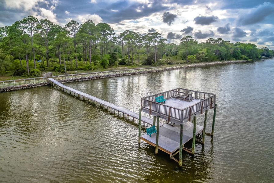 Lot 39 is perfect for your new beach homestead 1.55 acres! Steps from the Bay!! THE LARGEST PARCEL NEXT TO THE BAY!! Rare Find! See Attached Drone Footage! Build you own Dream Home steps away from Choctawhatchee Bay and enjoy community Boat Dock! This gated community of Seclusion Bay offers 53 estate-size lots with 15 acres dedicated to preservation. The lots range in size from .5 acres to 1.5 acres. This community is located within minutes to the beaches of 30A, shopping and dining as well as a short drive to Sandestin Golf and Beach Resort, Grand Boulevard and Sacred Heart Hospital. Buyer to verify all fees and lot dimensions. NEW DOCK is being built.Aerial Video https://www.dropbox.com/s/c6kprx80jw86ite/Seclusion%20Bay%20MLS.mov?dl=0