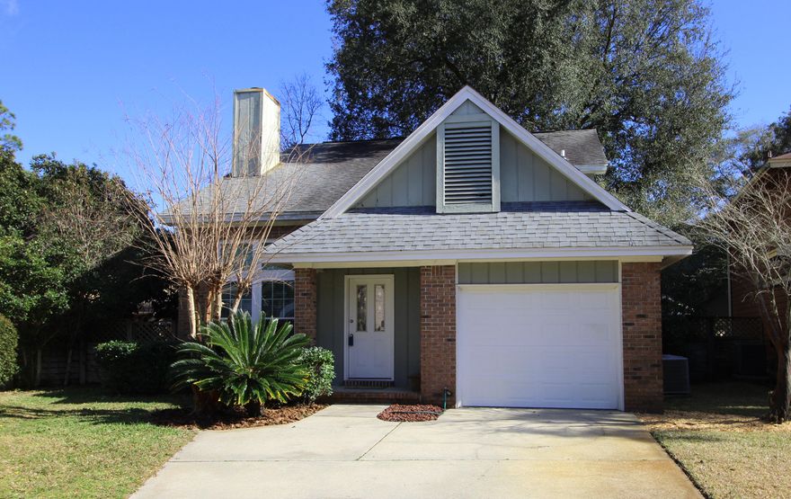 WOW! FANTASTIC HOME AT A GREAT PRICE IN THE DESIRABLE NEIGHBORHOOD OF CROSSWINDS! Step inside the foyer to find high vaulted ceilings, gas fireplace, tile flooring throughout and an open staircase that leads to the upstairs. Dining area is open to the living area made for entertaining. Kitchen has Corian countertops with a built-in sink, tiled backsplash and upgraded appliances. Cheerful and bright breakfast nook in a bay window with a door that accesses the open patio. Inside laundry area. Downstairs bedroom has tiled flooring and sliding glass doors that overlook the backyard. Updated downstairs bath with a designer vanity and shower. Large closet under the stairs for extra storage. Oversized master bedroom with high vaulted ceiling and plant ledge. Bath has double vanities
