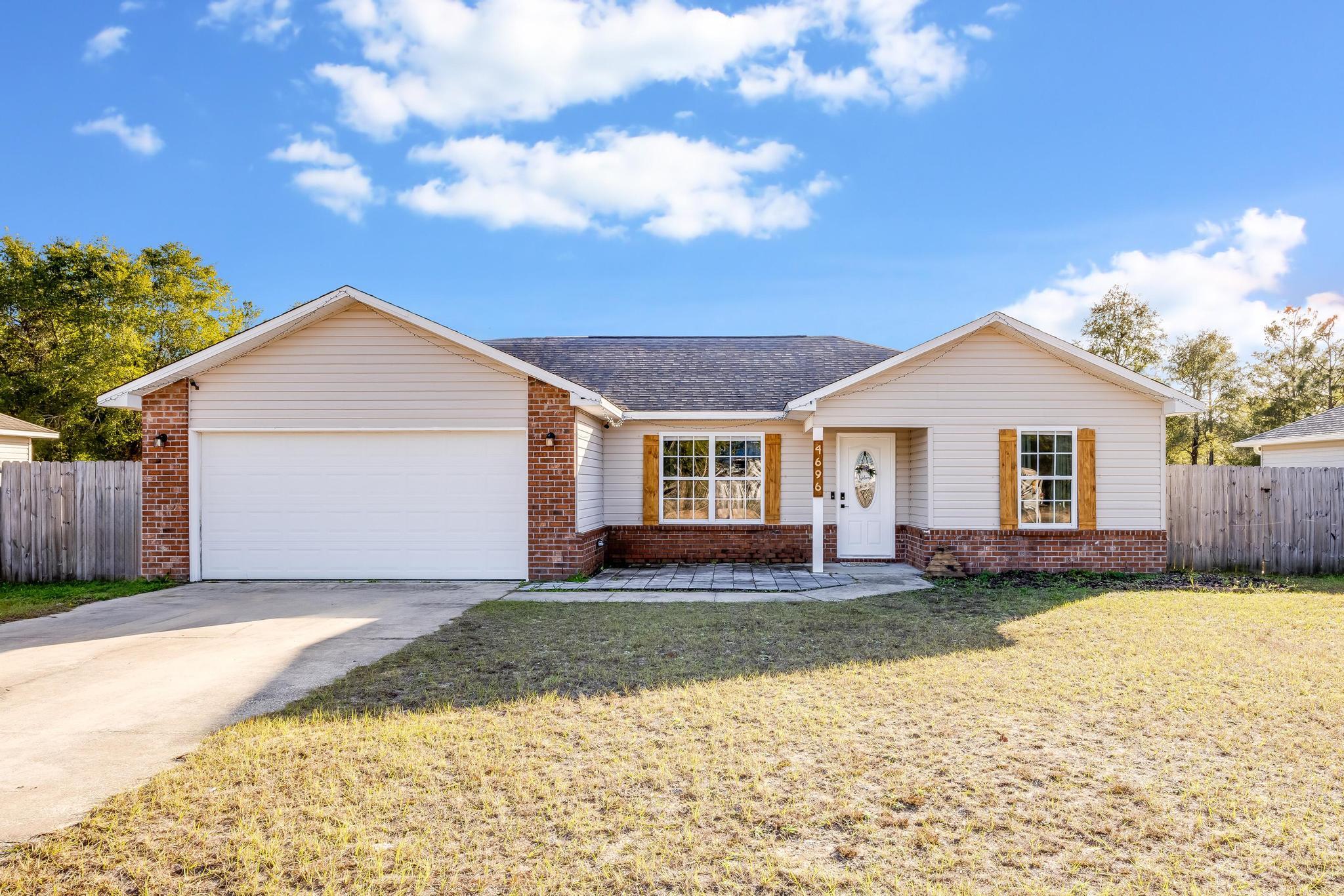 Situated on a quarter acre lot, escape to the serene countryside of Crestview where this charming 3 bed, 2 bathroom home awaits. This beautiful home is move-in ready! 2019 roof, Dec 2022 Water heater, 2024 HVAC, stainless steel appliances to include brand new dishwasher, septic tank pumped summer 2023, and termite bond with Insight Pest Solutions. Enjoy a split floor plan with an ensuite bathroom in the primary suite, open kitchen with plenty of cabinet storage, large open living room with lots of natural light. Enjoy the expansive, fully fenced backyard, complete with a double gate for convenient boat or RV storage access! It's 7 miles east of Crestview just off of highway 90 which makes it very convenient for commuting to 7th Group, Eglin, Destin and Niceville. It is approx 1.5 miles from the 1-10 interchange off Hwy 285.Perfectly positioned for effortless commuting to bases, beaches, schools, and shopping, this residence offers the ideal blend of convenience and tranquility.