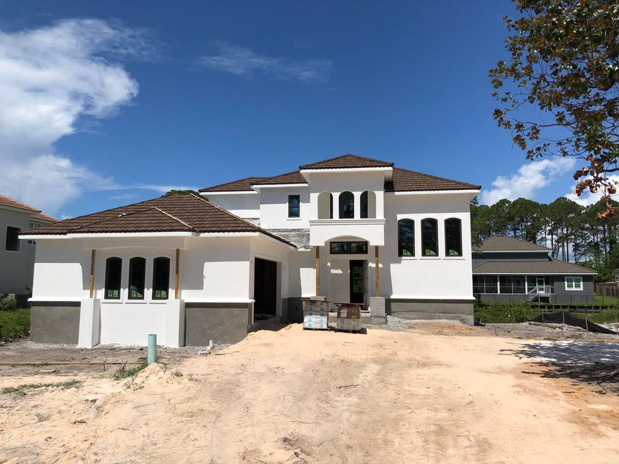 Ready for waterfront living in a beautiful gated community? Look no further, this new Mediterranean style home is ready for you! With a private Master retreat on the first floor and 3 additional bedrooms upstairs with beautiful views of the Santa Rosa Sound, relaxation awaits. This sale of this home also comes with your very own boat slip! (Boat Slip #1) Enjoy paddle boarding, kayaking, boating, swimming and more in the peaceful and beautiful Santa Rosa Sound just steps from your house, complete with a private community dock over 400' long and a beach area. This home is complete with all upgraded appliances, impact windows, upgraded tile flooring throughout the first floor and luxury carpet in the upstairs bedrooms. Enjoy the views from your screened in porch throughout the year! Call...