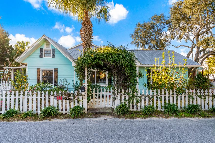Looking for a charming and vintage inspired beach cottage to escape to? 141 Miami is 100% an Old Florida Beach Cottage. Located just a few hundred yards from the beach, this large corner lot is a gardener's dream, with Orange, Key Lime, and Meyer Lemon trees. There is also Pomelo and Tandy planted in the naturally landscaped garden, which is irrigated throughout the property via a well pump. Built in the 1950's, this 3 bedroom & 2 full bathroom beach cottage has an abundance of history and undeniable character. The large corner lot features both a work shed and an air-conditioned outbuilding that could be used as a bunk space, quiet office, or play room. Raised decking runs throughout the back yard, surrounding the natural vegetation and citrus garden. 141 Miami Street exemplifies a common