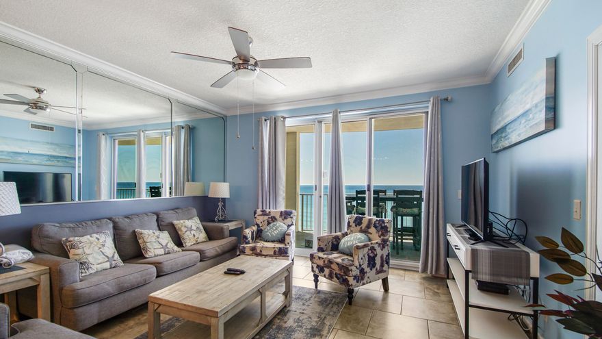 UPDATED! Direct Gulf Front. 2BR/2BA Condo, Assigned Parking Space, & owners storage unit right outside your front door. Extra-large bowed balcony overlooking the beach for spectacular sunset views. Updates: Flooring, bunk beds added, 8 seat poly wood table and chairs, lounge chairs, and microwave. This beautifully decorated and very clean unit is tastefully decorated for the perfect Beach Getaway! Crown molding, stainless appliances, backsplash, granite counter tops, renovated master shower, upscale furnishings, beachy decor and breath-taking views!!! Enjoy the spectacular views of The Gulf of America from the moment that you step inside your front door. Gulf front living and master suite has sliding glass doors to your private balcony. Twin Palms is a low density, gated complex with garage parking under complex, prime location is perfect for family vacationsjust a quick walk to Walmart, Pineapple Willy's, Restaurants and Entertainment. Enjoy resort-style amenities, including a gulf-front pool, fitness center, and direct beach access to the sugary-white sands of the world's most beautiful beaches. Complex was recently updated and is beautiful. Unit is just a few minute's drive to Pier Park Shopping and Fine Dining. Don't miss out on this one!!!