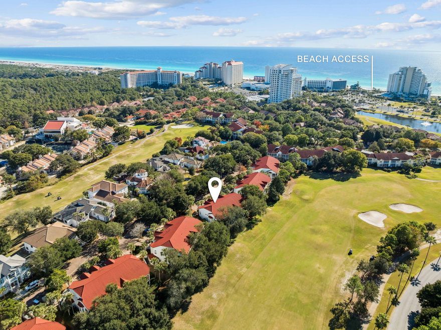 Beautifully renovated and thoughtfully designed, this 3-bedroom, 3-bath residence is nestled within the beachside enclave of Tivoli by the Sea inside the gated Sandestin Golf and Beach Resort. Offered fully furnished, this first-floor condo delivers effortless coastal living with refined finishes and a spacious, single-level layout. Step inside to an open floor plan where long-plank porcelain tile flooring flows seamlessly throughout, extending onto the screened-in patio. The kitchen is both functional and inviting, featuring a gas range, quartz countertops, stainless steel appliances, an extra-wide farmhouse sink, cherrywood cabinetry, and bar seatingperfect for casual gatherings or entertaining. A well-appointed wet bar enhances the space with a deep stainless prep sink, wine cooler, beverage cooler, and ice maker.

Each bedroom is outfitted with custom California Closets, providing exceptional storage, while the bathrooms showcase quartz countertops, paneled cabinetry, and spa-inspired rain shower heads. Additional updates include a new HVAC system installed in August 2021, a building roof replacement in 2022, and fresh exterior stucco paint completed in 2023.

The screened patio offers peaceful golf course views and is ideal for relaxing or entertaining, complete with a custom bar topped with limestone. The unit also includes a dedicated golf cart parking space with an electrical outlet for convenient charging, along with an owner's storage closet featuring custom heavy-duty steel shelving.

Residents enjoy exclusive beach access, a private Tivoli owners' pool, access to two additional Sandestin Owners Association pools, four championship golf courses, tennis courts, a full-service marina, and multiple spa options. Miles of walking and biking paths, kayak and bike rentals, and a convenient tunnel beneath Highway 98 provide seamless access between the beachside and bayside of the resort. Just moments away, The Village of Baytowne Wharf, Grand Boulevard, and The Market Shops offer a vibrant mix of dining, shopping, entertainment, live music, and family-friendly activities.