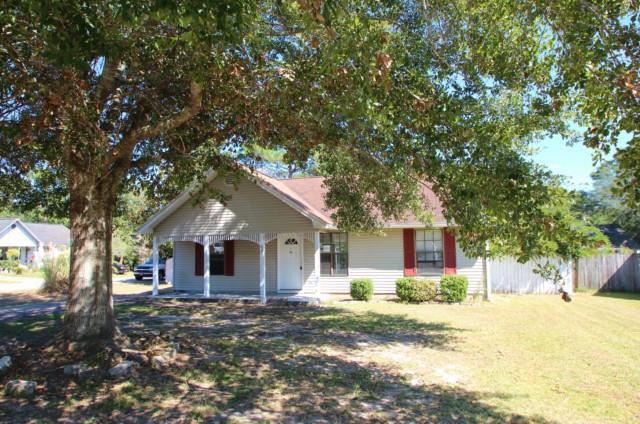 REO Charming home SOUTH of I-10! This 3bd/2 full bath home makes for a great home whether you are looking for a starter home or down sizing.Laminate and tile flooring throughout. The master bathroom updates include solid surface top sink and vanity with brushed nickel hardware. A AC/Heat and ductwork in the sunroom were replaced in Oct. 2005. Refrigerator, mounted microwave and stove/oven convey with the home. The back yard looks perfect with its country arbor, yard buildings and stone patio... perfect for entertaining. Take a look at pictures and a visual tour.