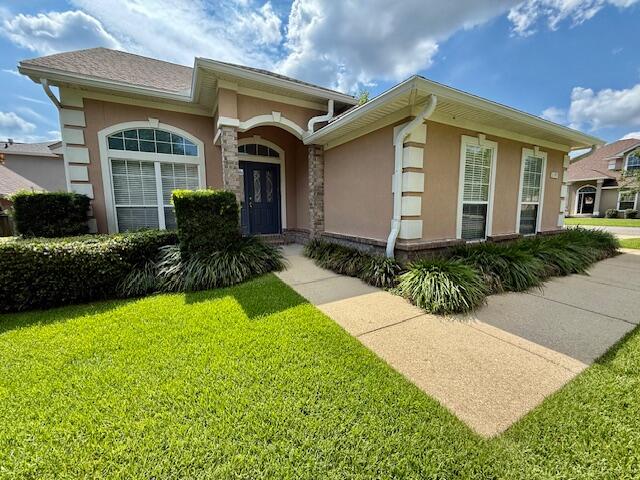 SEC DEP = $2295. YARD SERVICE INCLUDED IN THE RENT! SMALL/MEDIUM DOG FRIENDLY W/ OWNERS APPROVAL & W/ A NON-REFUNDABLE PET FEE. GORGEOUS 2 STORY BRICK/STUCCO HOME! CORNER/CUL-DE-SAC LOT! Newer interior paint & carpet! Home features a split bedroom plan for extra privacy. Living room has recessed lighting, gas fireplace & vaulted ceilings. Eat in kitchen features a dining area, breakfast bar, lots of cabinetry w/ lazy Susan's, recessed lighting, pantry, garbage disposal & all stainless steel appliances in place. Master suite downstairs; bathroom has cultured marble, separate shower, whirlpool tub, double vanity sinks & a walk in closet. Inside utility room w/ shelving. 1/2 bathroom downstairs for guests. Upstairs you will find 3 bedrooms (2 w/ walk in closets) & a full bathroom. Ceiling fans in all rooms except for wet areas. Side entry 2 car garage w/ auto garage door opener, shelving & attic storage. Outside you will find a privacy fenced backyard, lawn pump & sprinkler system on timer for easy lawn care & a covered back patio w/ recessed lighting & ceiling fans great for relaxing/entertaining. Close & convenient to both bases, schools, shopping, hospital, restaurants & the beautiful white sandy beach! Sorry, no smoking allowed anywhere on the property inside or out by Tenants or guests. Tenants required to view the property in person before applying & abide by the HOA rules. Only 2 vehicles allowed due to limited parking space.