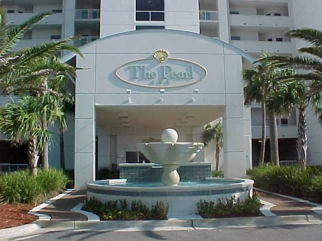 Rare opportunity to own a two bedroom PENTHOUSE at THE BEAUTIFUL PEARL OF NAVARRE BEACH. This is the perfect home, second home or vacation rental. The upgrades include a custom gourmet kitchen with top of the line appliances, granite counter tops in both the kitchen and wet bar. New designer tile through out the living area. 10 ft ceilings sets this 17th floor Penthouse home apart from all the rest. This home has privacy with coded elevator access and locked foyer. The views are spectacular from every room. The Pearl is known for it's unsurpassed construction and amenities. This home is being sold beautifully furnished. The Pearl is a gated community. Amenities include two pools (one heated in cool weather). A hot tub is also available for you on the lovely pool deck. You may exercise