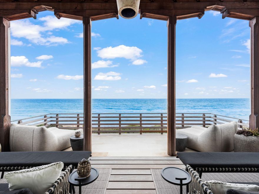 Coastal elegance and modern luxury blend to create the most exquisite gulf-front offering ever presented in Alys Beach. Expansive views provide an irreplicable experience along the sugar-white sands of the Emerald Coast, while European prominence and Bermudian history find their influence throughout this 4,527 sq. ft. Khoury Vogt-designed legacy property.  Curated selections from Dana Lynch Design create continuity throughout the home, which showcases a mix of limestone and white oak flooring, Calcutta Gold and Carrara marble countertops, and venetian plaster. Sweeping views are present from every floor, courtesy of Loewen floor-to-ceiling windows and handcrafted sliding doors.