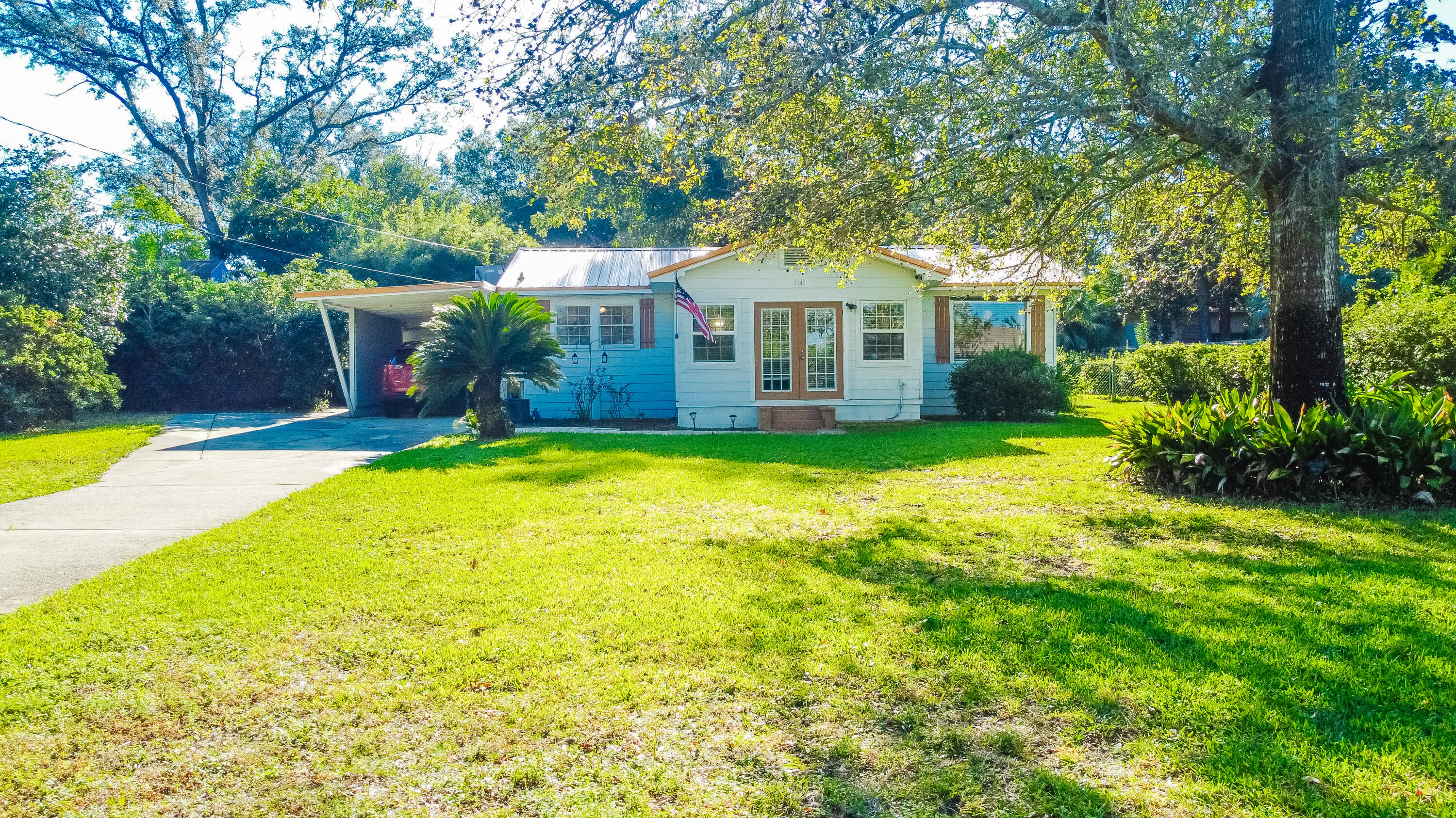 Wonderful home located on a great lot with a water view in Shalimar! As one of the first houses built on Longwood Drive, this 0.37 acre property showcases a large, fenced backyard with multiple seating areas that includes a covered porch & open patio, along with an above ground pool and yard buildings. The house features a metal roof, a whole house generator, an office/study, and a detached living space that includes a bedroom & full bathroom.  As part of the Longwood subdivision, enjoy access to the Longwood Community Park that includes picnic areas & boat launch. The property is located within 3.5 miles of Eglin AFB and within 7 miles of Downtown Ft Walton Beach. Schedule your showing today!