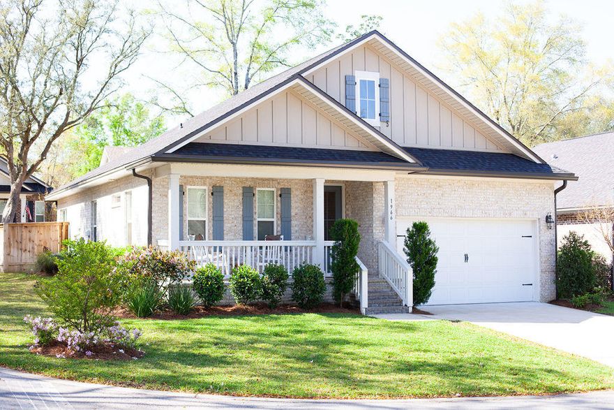 Welcome home to the quaint front porch community of Hattie's Grove.  This Randy Wise built all brick beauty sits on a corner lot surrounded with preserved hardwoods, all nestled in the heart of Niceville.  Large front porch, open floor plan, cased windows, crown molding and craftsman design are just a few of the many features this home provides.   Split floor plan with two bedrooms and a full bath in the front of the home with the master suite in the back.  Large family room is open to to the eat in area and kitchen which sports stainless appliances, gorgeous 3 cm granite and large breakfast bar with built in undermount sink.  Master suite and bath with double vanity, soaking tub, separate tile shower and