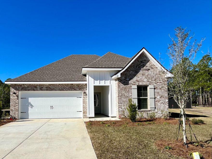 Located on a cul-de-sac lot the TRILLIUM IV G in Moonswept at Hammock Bay community offers a 3 bedroom, 2 full bathroom, open design.  Upgrades added (list attached).  Features: double vanity, garden tub, separate custom tiled shower with frameless door, and walk-in closet in the master suite, master closet opens to laundry room, covered front and rear porches, crown molding, recessed lighting, kitchen island, walk-in pantry, undermount sinks, framed mirrors, smoke/carbon monoxide detectors, landscaping package, architectural 30-year shingles, flood lights, and more!Energy Efficient Features: water heater, kitchen appliance package with electric range, vinyl low E windows, and more!