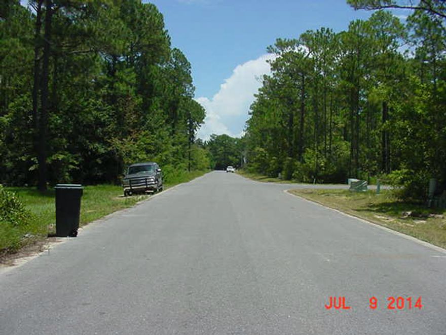 Just reduced OVER 20%!!! Paved roads, public sewer and water and $8,000 TAP FEES PAID.Oh My what a deal!!! Excellent building lot in Harstvedt Plantation. D R Horton Homes is now building in this S/D. Lot 28 is also available.