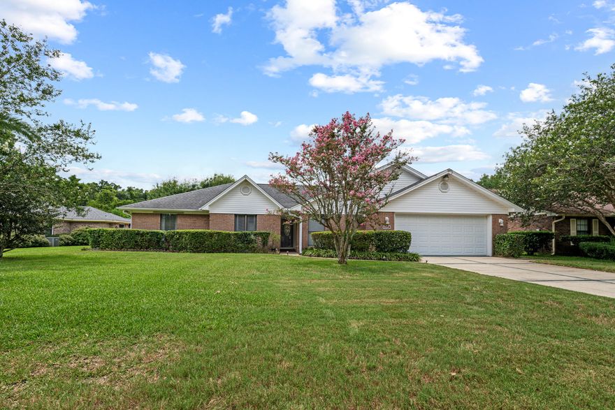 Welcome to this beautifully renovated 3-bedroom, 2-bathroom single-family home located in the quiet, family-oriented neighborhood of Belle Meadows. Designed with modern living in mind, this home features an open-concept layout that seamlessly blends comfort, style, and functionality.The heart of the home is the stunning modern kitchen, complete with soft-close cabinetry, sleek quartz countertops, subway tile backsplash, modern cypress shelving and a spacious walk-in pantry. Enjoy cooking with a full suite of stainless steel appliances, including a stove, dishwasher, microwave, and refrigerator. While the home is electric, gas is available in the community.The vaulted ceiling in the family room enhances the bright, airy feel of the space, complemented by a custom shiplap accent wall and a cozy electric fireplace. Fresh interior paint throughout adds a crisp, updated touch, while the open dining area creates the perfect space for hosting family meals or entertaining guests.
Retreat to the remodeled primary suite, which boasts a double vanity, tiled shower and large soaking tub ideal for relaxation. The secondary bathroom also features thoughtful upgrades, including a new vanity and shiplap walls for a clean, modern aesthetic.  Both guest bedrooms have built in desks and book cases! 
Step into the spacious Florida sunroomcomplete with heat and airthat overlooks a fully fenced backyard perfect for play and privacy. A mature pear tree, custom stamped concrete patio, and ample space for gatherings make this backyard an entertainer's dream. The current owner had plans for a custom pool oasis, and those plans are available for your reviewimagine the possibilities!
Additional highlights include a 2-car garage with a work bench, ideal for hobbies or extra storage. The location offers easy access to I-10, as well as nearby shopping, dining, and top-rated schools, making everyday living both convenient and enjoyable.
Don't miss your chance to own this turn-key beauty in one of the most desirable neighborhoodsschedule your private tour today! NEW WATER HEATER, ROOF is 7 YEARS OLD, SELLER WILL INCLUDE A FREE 1 YR HOME WARRANTY! 