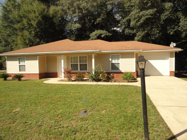 What a GEM! Nice corner lot zoned in the county for lower taxes. This 3/2/1 home is ready for your family. Low maintenance vinyl sided home has a split bedroom floor plan. The mature oak trees provide great shade in the back yard over the patio. See attachment for PAS requirements and WFHM offer submittal information in MLS document section.