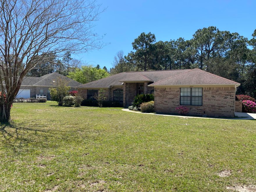 Beautiful all brick home in the Hidden Creek area of Holley by the Sea.   This home is a split floor plan with three bedrooms and two baths.  There is a den that can be used as a formal living area, office, or game room.  The back yard is an oasis with beautiful landscaping and an outdoor shed to keep your utility items stored away.  There is a side entry garage and in this neighborhood there are no overhead utilities draping across the front of your home.  Minutes away from Hidden Creek Golf Course, Navarre Beach, Eglin AFB and Hurlburt AFB and the many restaurants and activities the area offers.