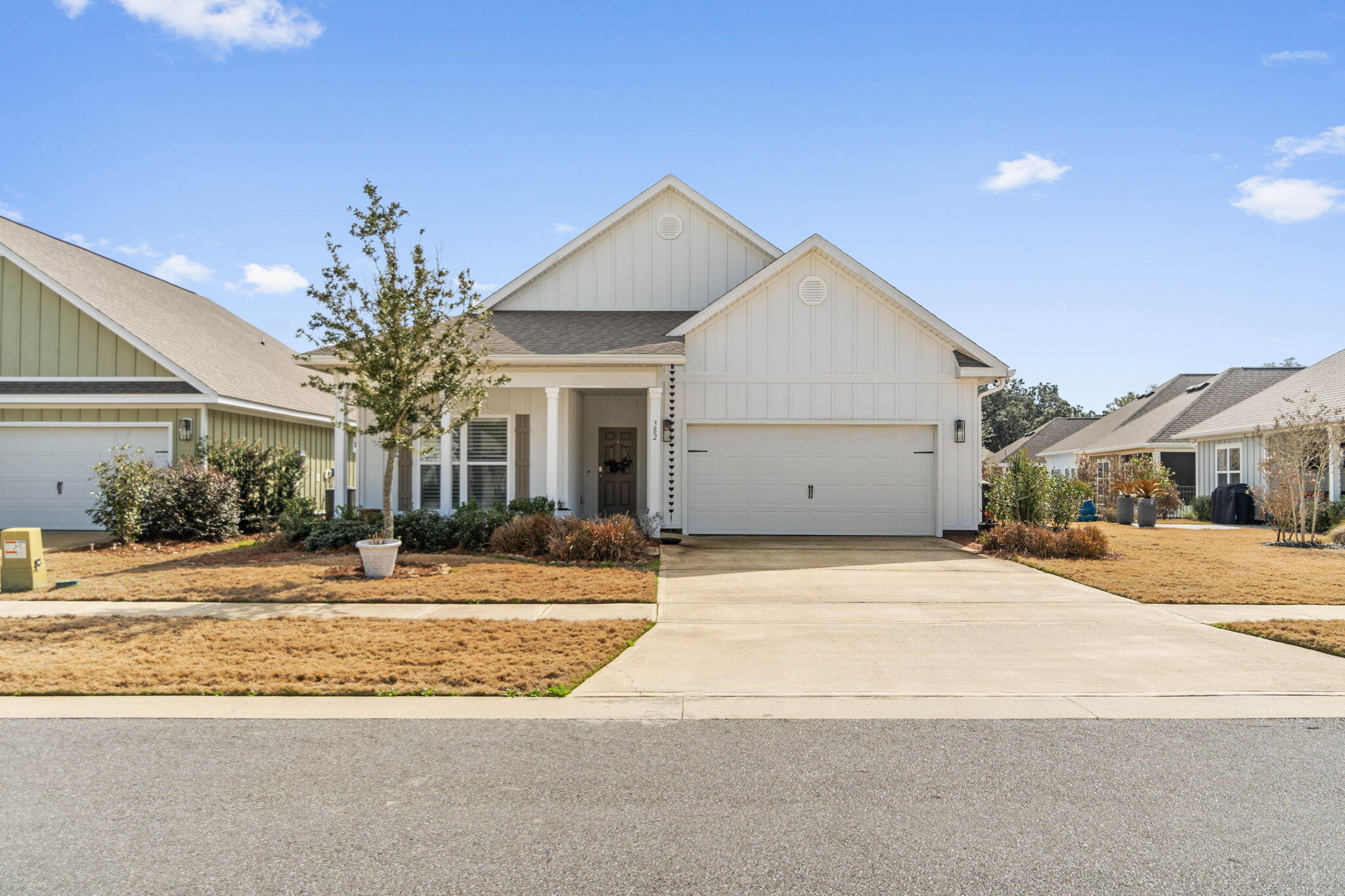 Experience luxury in Freedom Homes Arlington plan. Built with top-of-the-line materials for durability & energy efficiency. Exterior boasts Hardie siding, aluminum fascia & weather-resistant house wrap. Reinforced concrete foundation & dimensional shingles w/ 30-year warranty. Inside, 9-foot ceilings & Wood-look tile plank flooring create a spacious feel. Enjoy outdoor living in the screened-in porch. Seller has added plantation shutters throughout. Gourmet kitchen equipped with stainless steel appliances and stone counters. A perfect blend of style & functionality