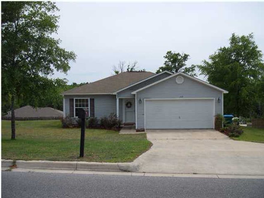 Check out this great home in a great location! North of I-10, close & convenient to schools/shopping/restaurants/churches. Less than 30 min. from (Eglin, Duke, 7th) bases & less than an hour to the beautiful beaches! TRANE HVAC UNIT INSTALLED 4/2013! Nice neighborhood w/ decorative mailboxes, street lights & underground utilities. Open dining/kitchen/living combo w/ raised ceilings & plant ledges. Kitchen has a breakfast bar, pantry & all appliances in place. Split bedroom plan for extra privacy. Walk in closet in master & 1 of the addt'l bedrooms. Mostly wood laminate flooring, except tile in the wet areas & carpet in the 2 addt'l bedrooms. All electric! 2 car garage w/ auto opener & w/d hookups. Lg back & side yard w/ a back deck for your morning coffee! Call today, priced to sell fast!