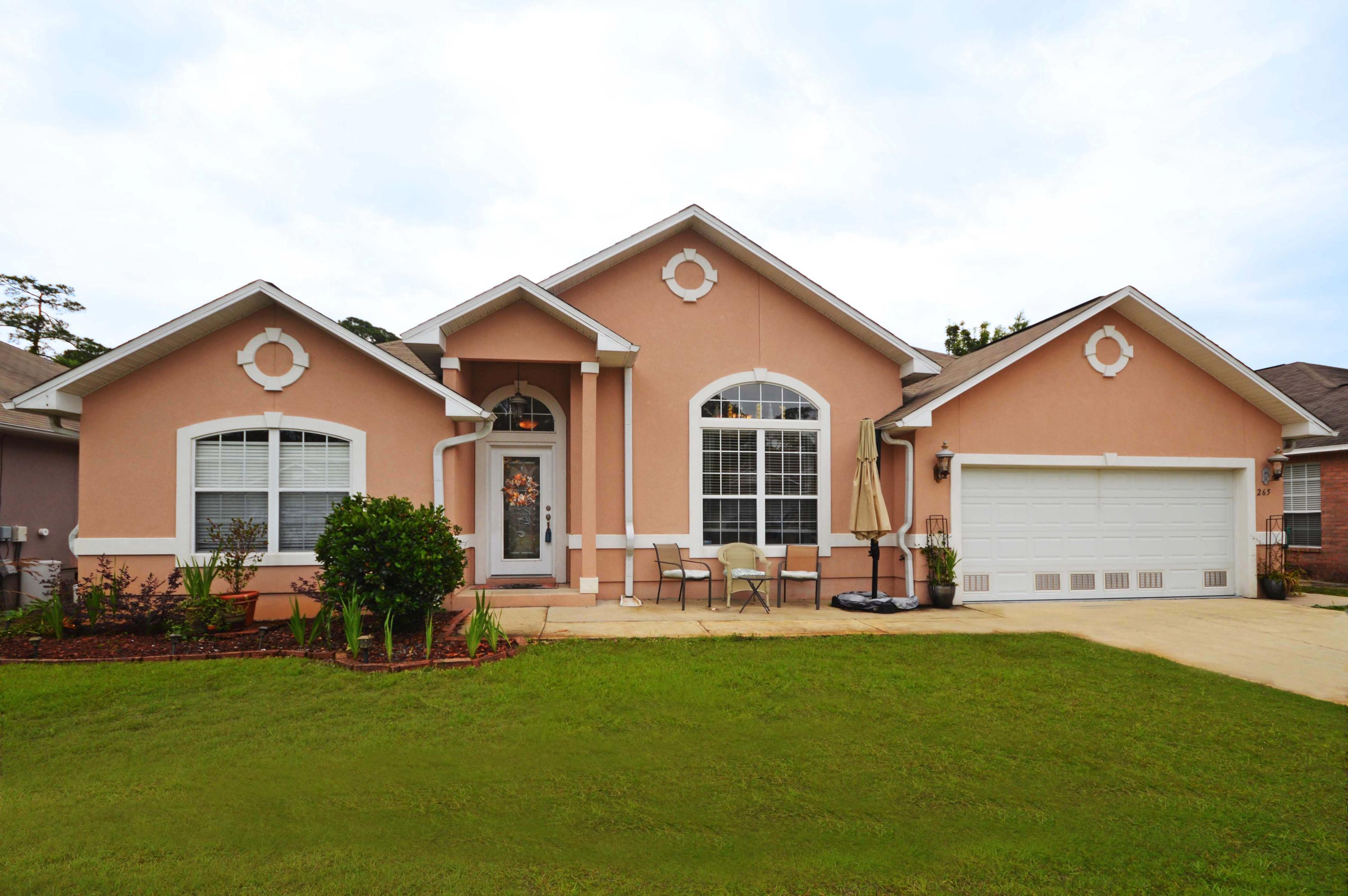 3 MILES FROM HURLBURT, STAINLESS STEEL, GATED COMMUNITY, CROWN MOLDING, GRANITE COUNTER TOPS, TILE FLOORING, WOOD FLOORING, RAISED CEILINGS,MASTER SUITE, PRIVACY FENCE, 2013 HVAC. This upgraded home 3 miles away from base in Mary Ester is settled in a gated community. The floor plan is both split and open. Ideal for entertaining or relaxing in the master bedroom while others occupy the 3 adjacent rooms. The master bathroom boast double vanity sinks, a garden tub, separate shower, and a water room. The living area has bamboo flooring, raised ceilings, and a tile fireplace creating an elegant layout. The kitchen is well planed with upgraded cabinets, STAINLESS STEEL appliances, GRANITE counter tops and a large pantry making this crown jewel a pleasure to cook in. 3 MILES FROM HURLBURT.