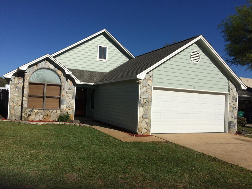 Location, Location, Location! Just minutes from Eglin, Hurlburt, and beach! Located on a quiet cul-de-sac, this contemporary home boasts cathedral ceilings, stone fireplace and an open floor plan. Master with walk-in closet and dual vanity in master bath. Sellers removed all carpeting and stained cement floors (needs flooring). Numerous up grades to include, fresh exterior paint (but needs interior paint), A/C in 2015 with extra insulation for added energy savings, stainless appliances, and refinished kitchen counter tops. Attached screened Florida room. Privacy fenced with pump and sprinkler system. Lawn pump and sprinkler system works great but will convey as is. Great curb appeal. This home has a two car garage with side exterior door. Quiet street with underground utilities.