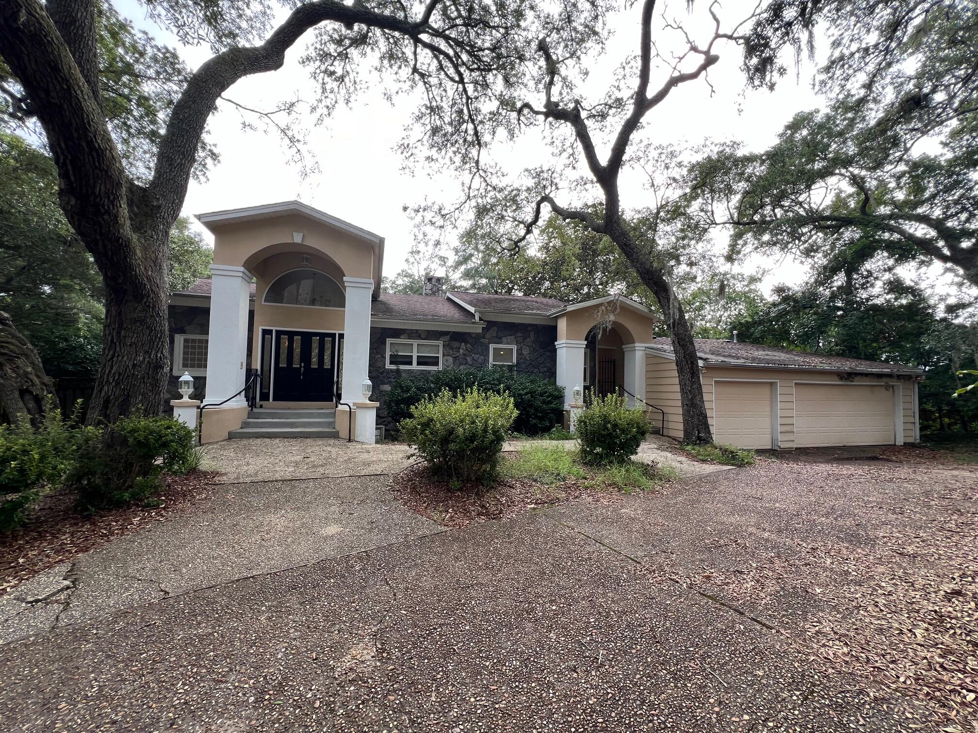 Gorgeous Waterfront Location, Close to Beaches, Bases, Schools & Shopping! 106 feet on protected deep water of Chula Vista Bayou, this Waterfront 4 Bedroom, 3.5 Bath home is located at the end of a cul-de-sac and has a 3-Car Garage! There is laminate and tile flooring throughout most of the home. The 2nd (main) floor has multiple wall-to-wall over-size sliding glass doors overlooking the bayou. There is a Large Primary Living Room with a Serene Waterfront view and features high ceilings, plenty of natural light and a two-sided wood burning fireplace that also adjoins the Dining Room. The Gourmet Kitchen has Wood Cabinets, Granite Counter Tops, a second Sink, 2 Pantries, Breakfast Bar, Cooktop, GE Profile Oven, Microwave and opens to the Breakfast Room. The Laundry Room has a utility sink and lots of storage space. The Waterfront Master Suite has a walk-in closet with plenty of storage space, Jacuzzi tub, Two Vanities and an elegant Tiled Shower. The loft in Master is accessible through a ladder in the closet. There is half bath for guests. Downstairs/Basement has a Large Living room with Fireplace and built in Bookcases, 2 additional Large Bedrooms, a Wet Bar, 2 full Baths PLUS an office (with built-in bookcases) that can be utilized as an additional bedroom! One of the Bedrooms has two large closets and a door that leads to the Back yard. Outside, you will enjoy an amazing back yard oasis with a private composite Decking balcony, open and covered patio areas, shed, dock (needs work but is functional,) sparkling Gunite, In-Ground Pool w/Spa! This is the perfect place to relax or entertain! The three car garage is high and wide with lots of vertical space in addition to the three car spaces. There is also a lawn pump/Sprinkler system, security system and a Whole House Gas Generator (offered as-is.) The HVAC is a high efficiency Geo-Thermal unit! This home is also listed for sale.