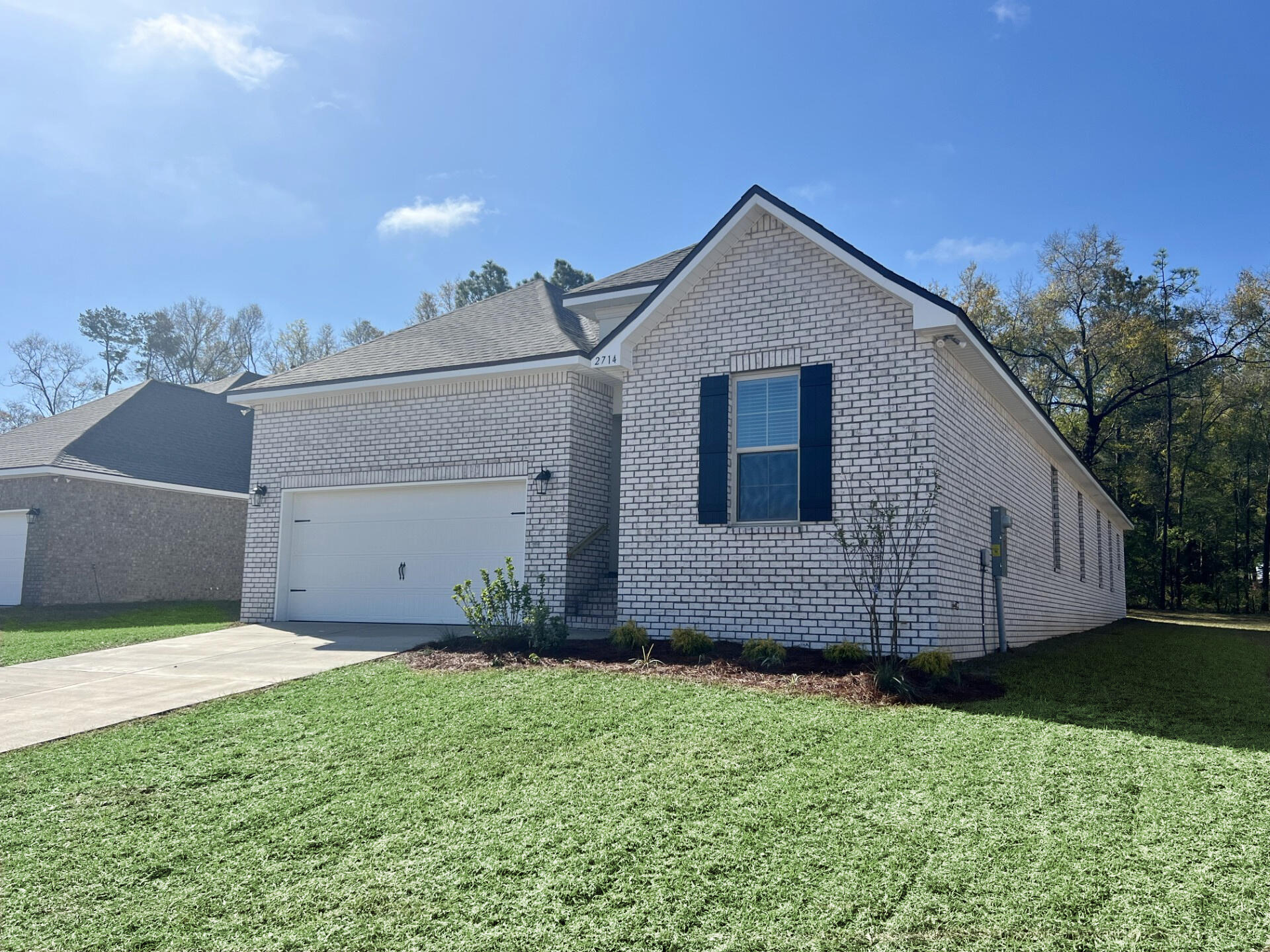 Awesome builder rate plus FREE front gutters. Restrictions apply.The CEDAR IV A in Young Oaks community offers a 4 bedroom, 3 full bathroom, open design. Upgrades added (list attached).Features: double vanity, garden tub, separate shower, and walk-in closet in master bath, en suite bath in bed 2, kitchen island, walk-in pantry, boot bench in mudroom, covered rear patio, crown molding, recessed lighting, ceiling fans in living and master, framed mirrors in all baths, landscaping, architectural 30-year shingles, flood lights, and more!Energy Efficient Features: water heater, electric kitchen appliance package, vinyl low E MI windows, and more! Energy Star Partner.