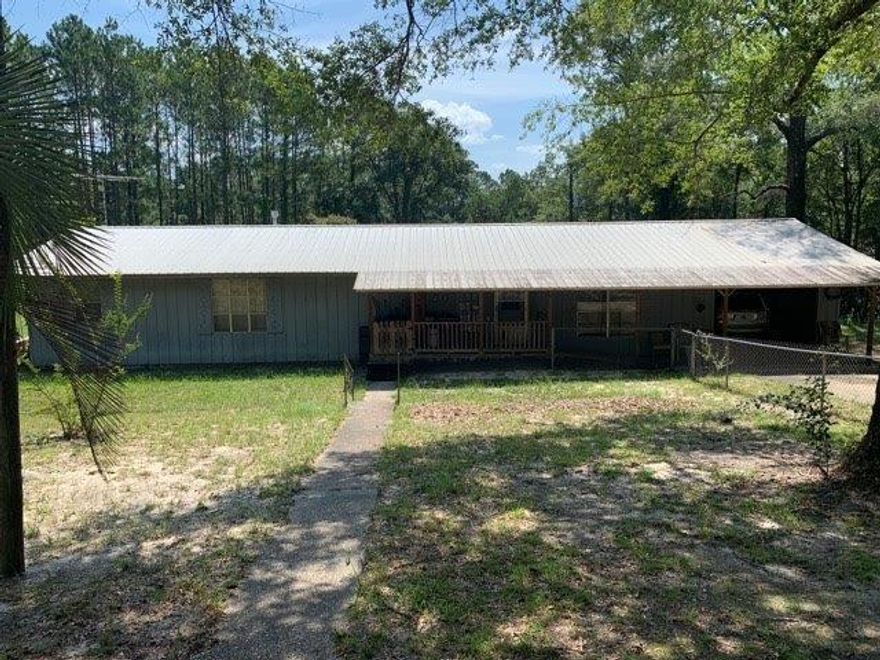 Here's Your Next Flip!3 bedroom 2 bath house on a large 2.02 acre lot! Just off of US-90, this property features a large car barn, New AC and furnace, plus a newer water heater. House could use some updating to reach it's full potential.