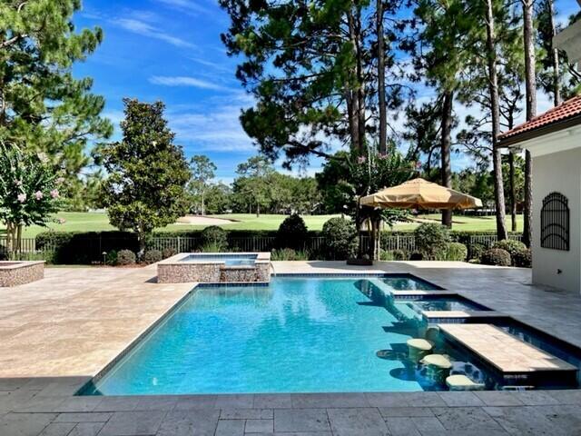This one-story Mediterranean style pool home is situated on the 2nd fairway of the Raven Golf Course checks a lot of boxes for today's homebuyers! Well-maintained home with beautiful pool/spa/firepit, and outdoor kitchen with full pool bath. This is a home for entertaining...and pool has a swim up bar and you can watch the big game while you're in the pool! Floor plan has high ceilings with 2 Master Bedrooms with easy access to the pool area. All bedrooms have ensuite baths and office has a closet. There is a 3-car garage giving you a place to park your golf cart comfortably. Wonderful neighborhood in Sandestin and you can golf cart to the beach, the Baytowne Marina, and lots of good restaurants and shopping. It's a fun lifestyle here in Sandestin and this is a wonderful neighborhood!