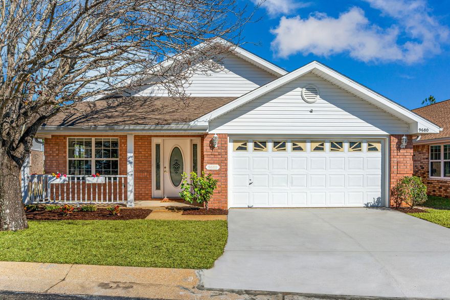 Perfectly situated waterfront home in gated community. As you enter this spacious home, you will love the new LPV flooring throughout. No carpet! Whole home is newly painted! The main rooms all feature vaulted ceilings and all are spacious and bright. The formal living room gives you flex space and flows well into the kitchen. Kitchen features new granite counters, breakfast bar, panty, eat in area, and white cabinetry. The living room opens into a huge living space with fireplace and French doors opening onto your lakefront patio. Bedrooms are a split floor plan and all boast new LPV flooring. The master bedroom features a huge walk in closet, ceiling fan, and double vanity in the master bathroom. Indoor laundry room and two car garage. Inground sprinkler system and lake front views!