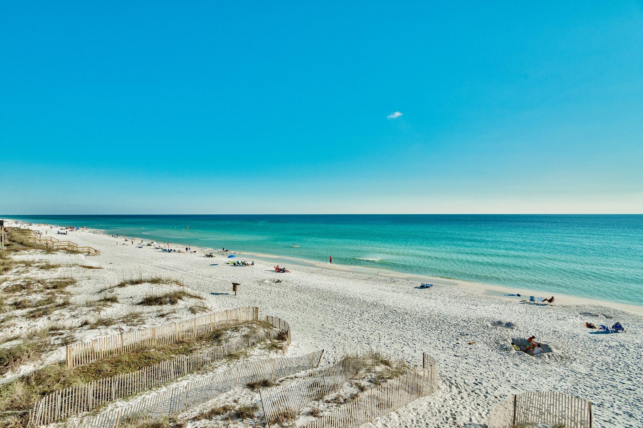 Gorgeous Gulf Views from all four levels. This home has three spacious bedrooms including a 1/1 lockout area with separate kitchen, laundry room, family room and outdoor gathering deck. Two new sleeper sofas, patio furniture new shower and roof replaced in 2017. No HOA and excellent rental potential. Excellent location near shops and restaurants, on the West end of the townhomes offering larger deck and patio spaces. Stair placement maximizes the Gulf Views!Fully furnished and rental ready.