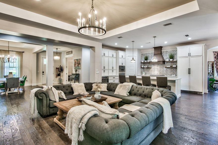 This stunning one of a kind home is located within the lush pristine gated community of Wild Heron near Scenic 30A. Situated on a large lot that backs up to the golf course, this one story custom luxury retreat includes four bedrooms and three full baths as well as a very spacious garage.