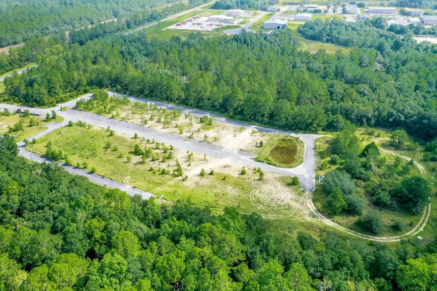 Fully Entitled Warehouse & Flex Space Project located in the heart of the emerging market of Freeport, Florida!  The infrastructure of the first phase of this two-phase project is in place and ready to accommodate vertical construction of warehouse and office space, which will cater to the enormous, national record-breaking growth of Walton County and surrounding areas!  Phase I is permitted for 43,170 SF of warehouse space and 20,918 SF of office space.Phase II, once developed, will contain 74,182 SF of warehouse space and 35,514 SF of office space.The total site area contains 12.68 acres, under a Light Industrial zoning district, and a future land use category of Industrial.
