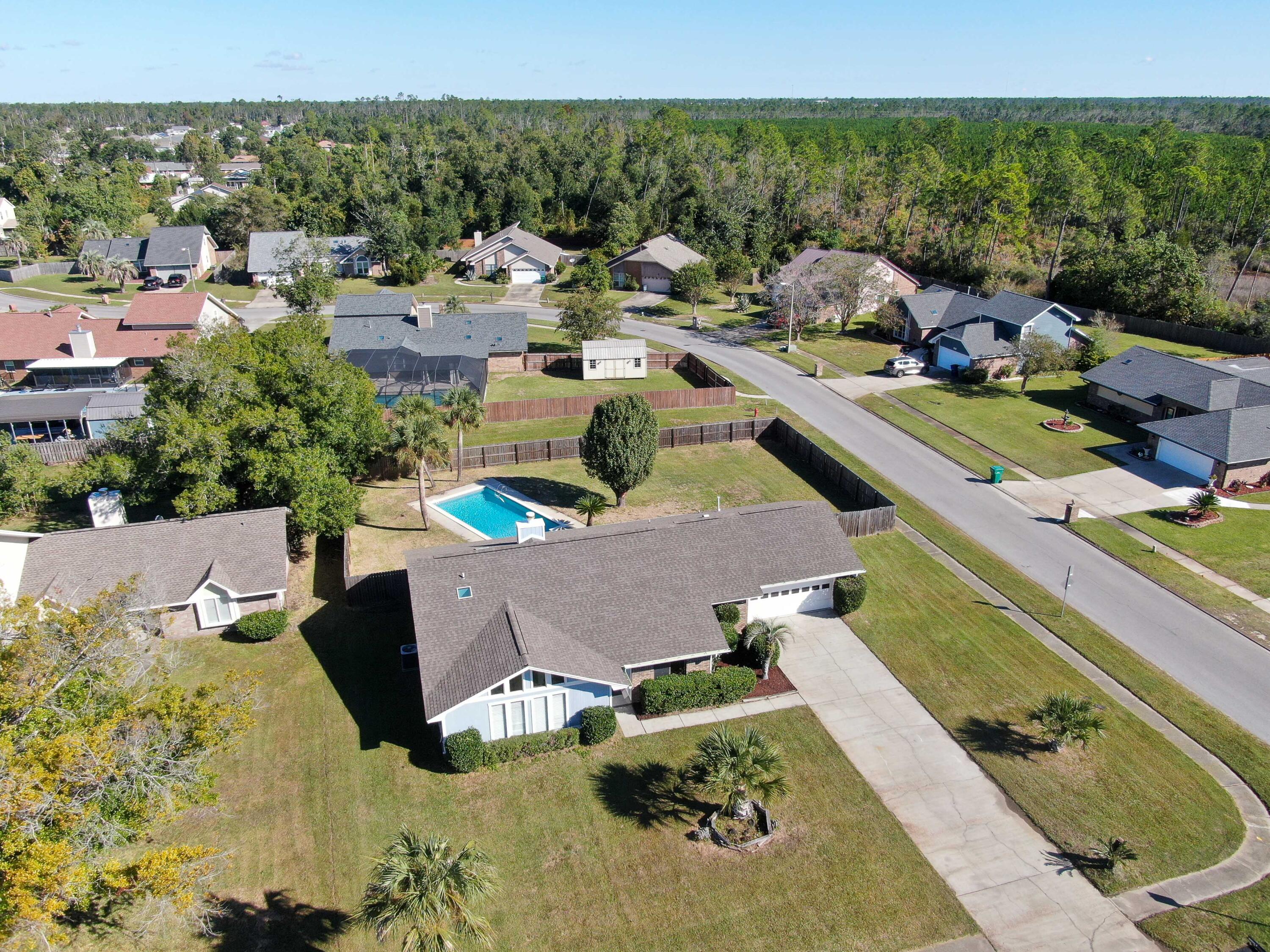 Welcome to your dream home in the heart of Panama City, just a stone's throw away from Tyndall Air Force Base. This beautiful 3-bedroom, 2-bathroom home boasts 1,822 square feet of living space and is a shining example of modern comfort and style. As you step inside, you'll be greeted by an abundance of natural light that floods every corner of this home. With all new paint, new flooring in the bedrooms and living spaces, and tons of storage throughout. This home has an eat-in kitchen with brand-new modern appliances and ample counter space. For more formal meals, there is a separate dining area that is both elegant and functional.In the cozy living room, you'll find a new electric fireplace, providing warmth and ambiance,
