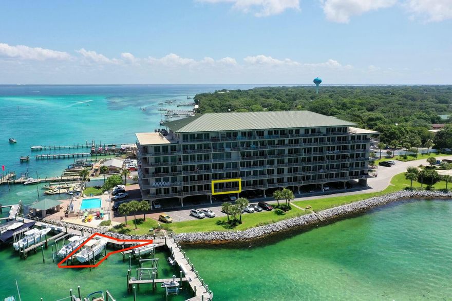 The Owner is motivated to sell! Price reduced to $899,000 with a $10,000 buyer incentive at closing, this 3BR/3BA waterfront residence is a boater's dream--complete with a 30' deeded boat slip with a 16k lb lift and separate jet ski lift. Located in Destin's exclusive Sides Moreno Point West, enjoy 180 views of Crab Island, East Pass, and the Gulf from your 240 sq ft balcony--large enough for sectional seating, al fresco dining, and sunbathing. The freshly painted 2,196 sq ft interior features 10' ceilings, crown molding, and an open layout ideal for entertaining.Read on to discover how this rare offering blends effortless boating with coastal luxury. Crafted for those drawn to the water, this light-filled condo provides direct access to Destin Harbor, Choctawhatchee Bay, and the Gulf. Fish from the dock, paddle into tranquil waters, or head offshoreit's all at your doorstep. Inside, expansive countertops, a breakfast bar, and wet bar make entertaining easy, while the primary suite features balcony access, a jetted tub, separate shower, dual vanities, and a large walk-in closet. Lovingly maintained by its original owner as a primary residence since 2004, the home is a blank canvas ready to reflect your personal style. Sides Moreno Point West is a rental-restricted, low-density community of just 44 unitsoffering peace, quiet, and security with only one tenant allowed per every 30 days. The building has successfully completed its Structural Integrity Reserve Study (SIRS), is well-managed by a proactive Board, and maintains ample reserves. Notably, the Board has reduced insurance premiums by approximately $100,000 over the past two years. Residents enjoy gated entry, covered parking, paddleboard/kayak storage, private storage unit, BBQ area, and a beautifully landscaped waterfront pool. This is Destin living at its most refined.