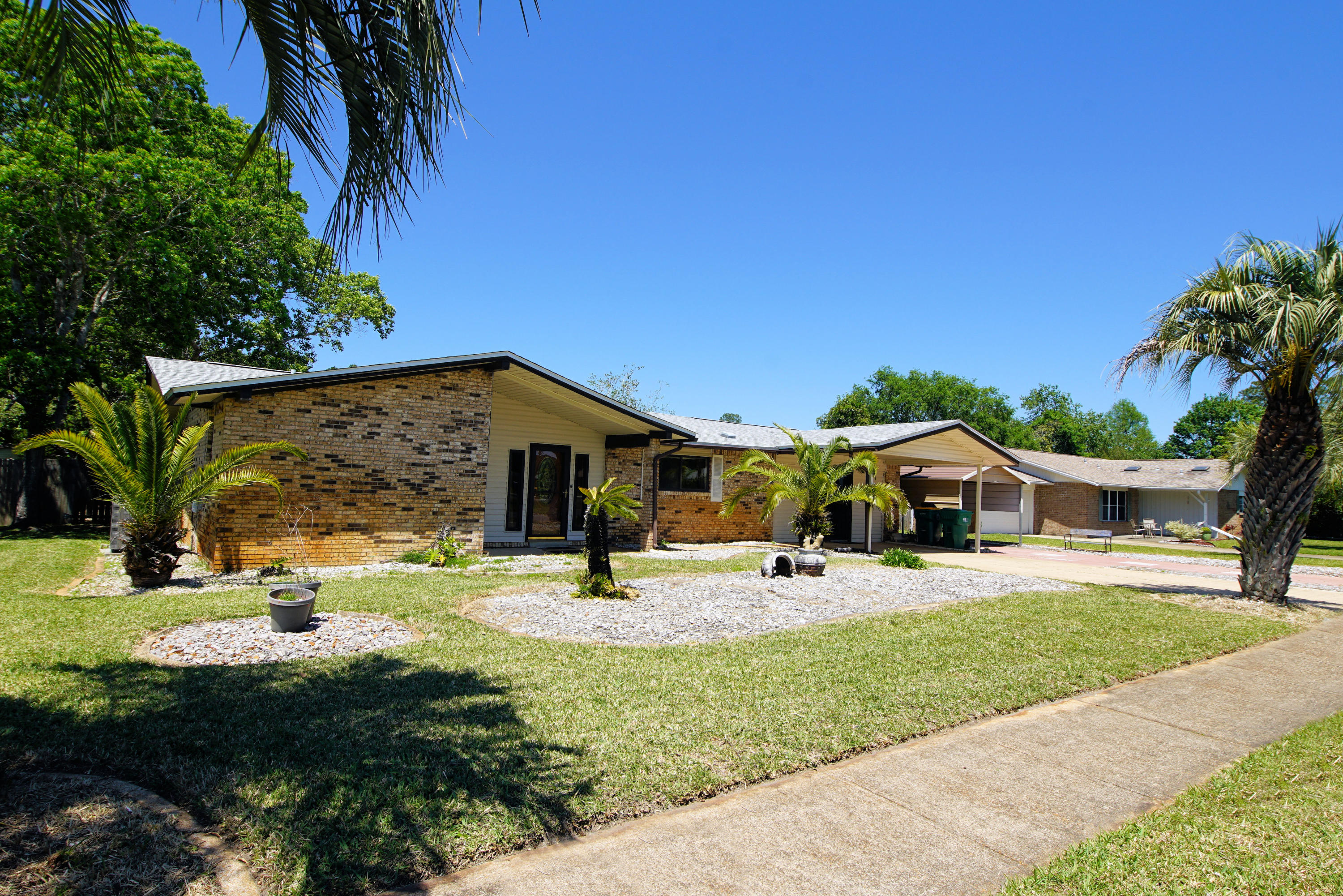 Beautiful 3/2 residence awaits you in Northgate, one of the most desired family communities in all Fort Walton Beach. New roof April 2019. New water heater March 2019. The converted garage/living room and kitchen are open and flow into the family room and large Florida room. Exit the Florida room to a large covered patio that leads to the fenced backyard that includes a work shed/storage building. A guest bathroom adjoins one of the bedrooms and was renovated to accommodate a wheel chair. There is room to park at least 5 cars or even an RV! The home is also conveniently located near Eglin, Hurlburt, the beaches and a multitude of shopping centers on Mary Esther Cutoff. Make your appointment to view today!