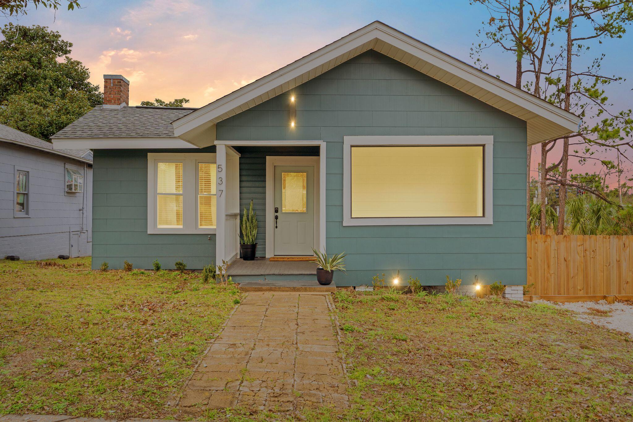 This is truly a rare find! A completely remodeled 1925 home that sits on .32 acres in Cove! This beautiful 2 bedroom and 1 bath offers a modern boho vibe with BRAND NEW plumbing, electrical, HVAC, roof, insulation, sheetrock and a 100+ year old clawfoot tub that was restored. The concept for the remodel was carefully thought through and planned out to keep the original character intact but with new modern finishes and fixtures. This would make for a great rental property to add to anyone's current portfolio with its close proximity to all that historical downtown Panama City has to offer. The AIRBNB potential is endless! Or long term rent for stability in your investment. Also, this home could make a great office for a business that needs a lot of room to store vehicles or equipment!