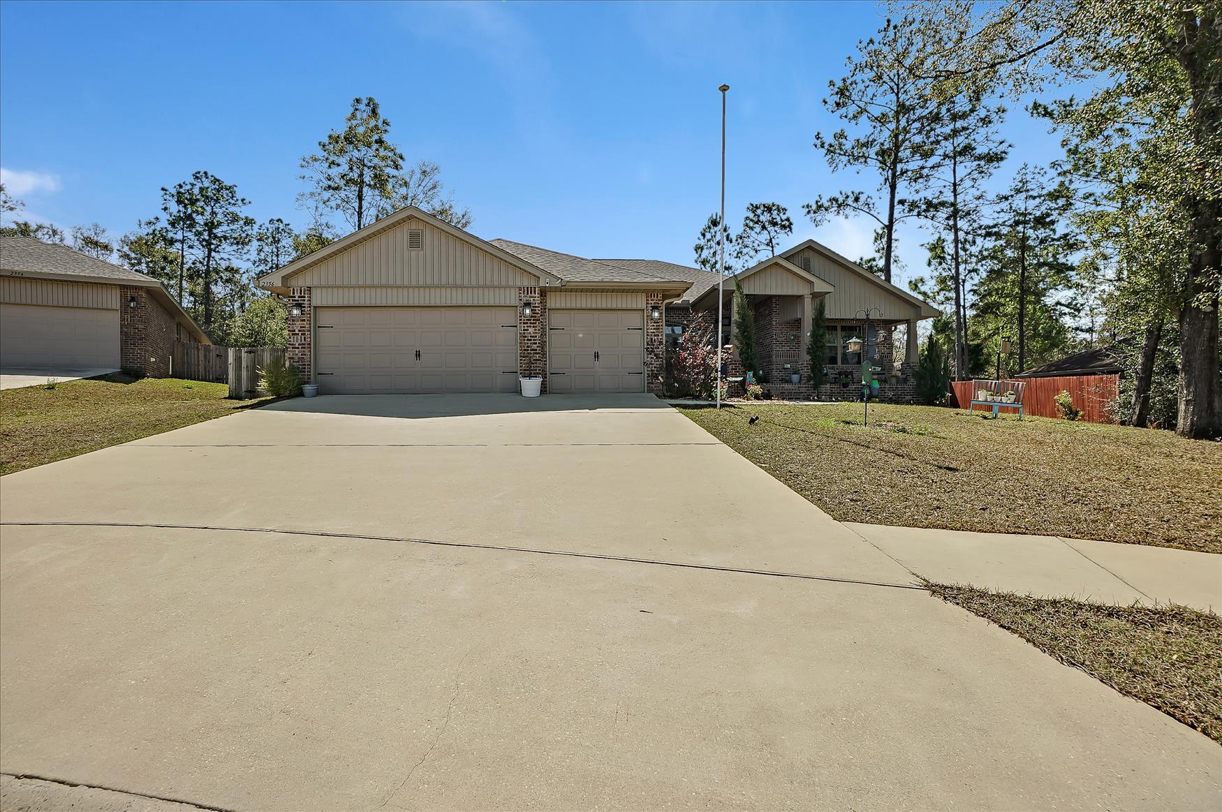 This well-loved, captivating 4-bedroom, 3-bathroom Traditional split floor plan is located within Crestview's Nanterre the Riverfront Community, a highly desirable area. Away from the hustle and bustle but an easy commute to the city, Air Force Base and schools means more time to enjoy spectacular view of the natural woods. Exteriors include inviting patio and breezy front and back porches. Across the threshold, nice touches include a grand entryway, high ceilings, open floor plan with a bonus/flex room. Kitchen includes custom cabinets, granite counter tops, breakfast bar and pantry. The calm master bedroom includes two walk-in closets, private bath, 2 separate sinks with Garden tub and step-in shower. The other three bedrooms, situated on the main floor for maximum convenience,
