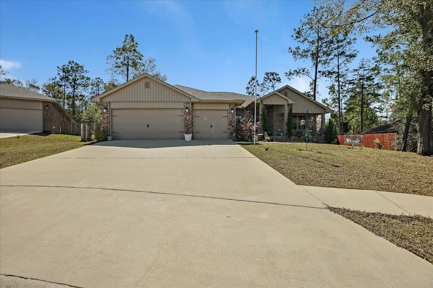 This well-loved, captivating 4-bedroom, 3-bathroom Traditional split floor plan is located within Crestview's Nanterre the Riverfront Community, a highly desirable area. Away from the hustle and bustle but an easy commute to the city, Air Force Base and schools means more time to enjoy spectacular view of the natural woods. Exteriors include inviting patio and breezy front and back porches. Across the threshold, nice touches include a grand entryway, high ceilings, open floor plan with a bonus/flex room. Kitchen includes custom cabinets, granite counter tops, breakfast bar and pantry.  The calm master bedroom includes two walk-in closets, private bath, 2 separate sinks with Garden tub and step-in shower. The other three bedrooms, situated on the main floor for maximum convenience,