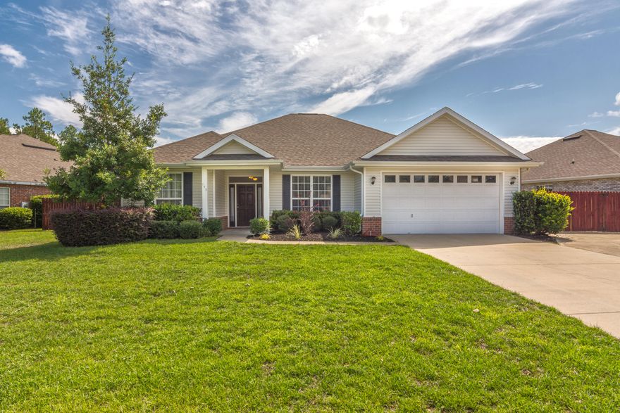 Stunning 4 bedroom 2 bath home located in South Crestview with easy commute to all the local bases, beaches, and shopping centers. Built by local custom builder you will right away notices the features including 36'' raised panel cabinets, crown molding, trayed ceilings, solid surface countertops and much much more. Large living room great for entertaining family and friends and rounding up the kids for a family movie night. Kitchen boasts plenty of cabinet and counter space for all your cooking needs. Master bath has a separate shower and tub as well as dual vanity. Let the kids and family dog play safely in the large fenced in backyard. Schedule your showing today!!!